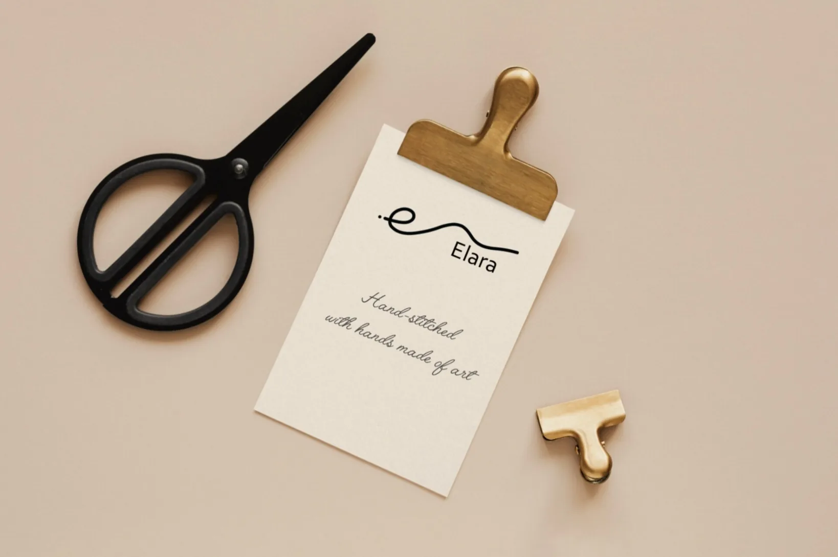 Elara — “Hand stitched with hands made of art.”