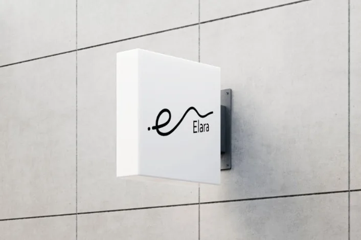 Elara — Exterior signage.